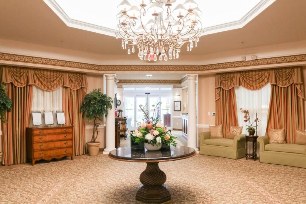 Grand Lobby with Crystal Chandelier at Memory Care Facility