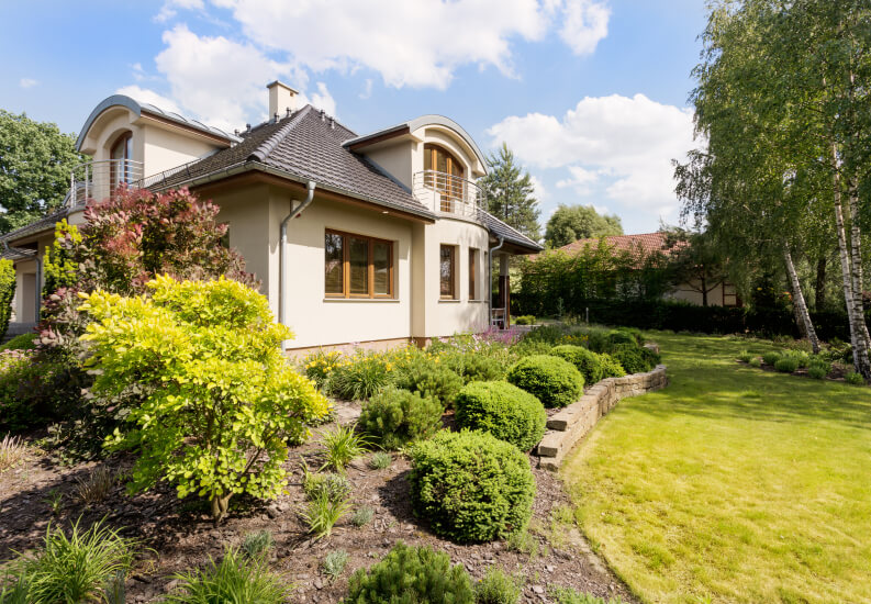 Contemporary Home With Curved Architecture and Manicured Lawn at Independent Living Facility Contemporary Home With Curved Architecture and Manicured Lawn at Independent Living Facility